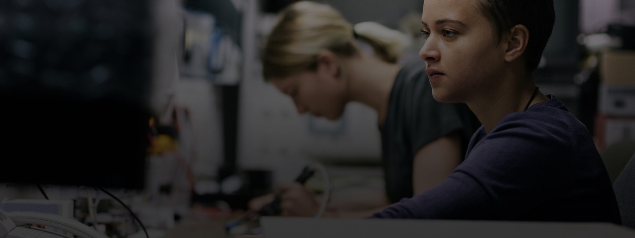 Two women working together on an experiment